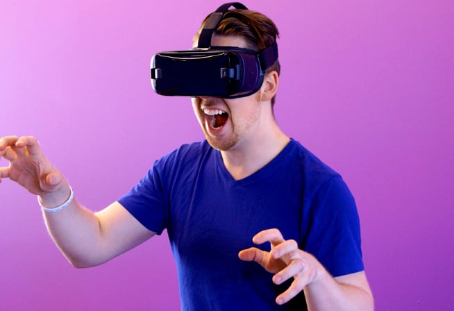 a man wearing interacting virtual reality glasses